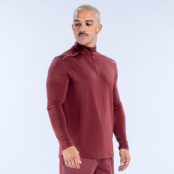 Maroon quarter-zip long-sleeve athletic top with slim fit and front zipper