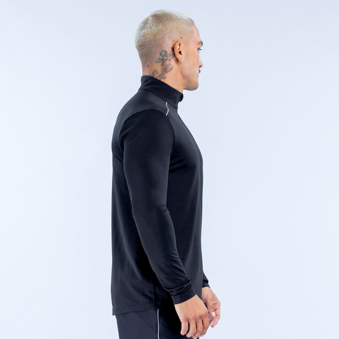 Black quarter-zip pullover, side profile, mock neck and long sleeves