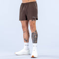 Men's dark brown 4-inch training shorts with elastic waistband and small thigh logo