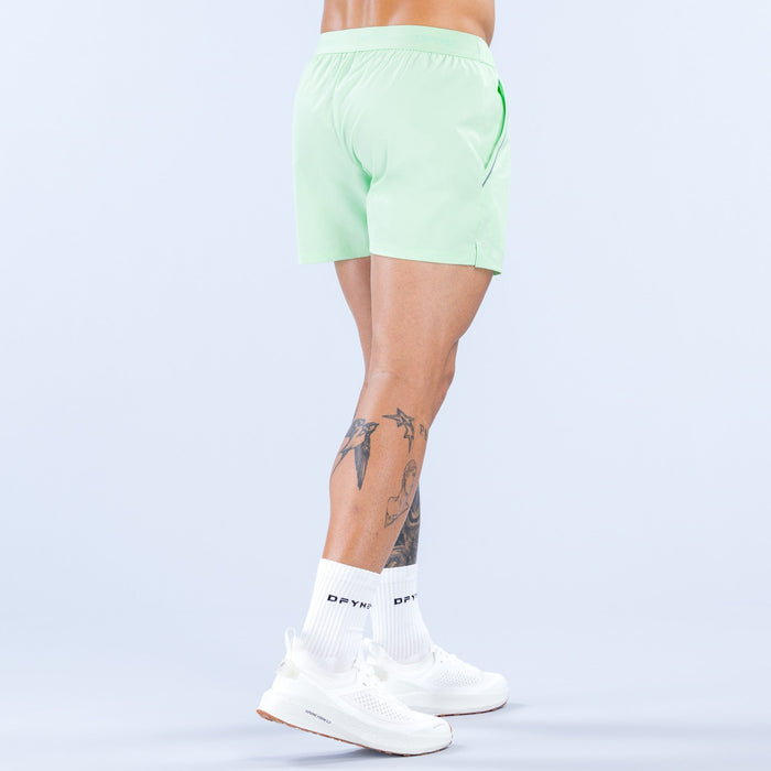 Mint green training shorts, back view, elastic waistband with drawstring