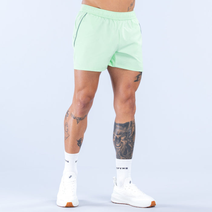 Mint green 4-inch training shorts, front view, relaxed fit and elastic waistband