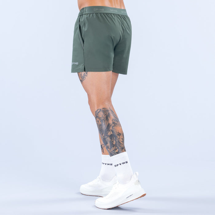4-in training shorts, dark green with elastic waistband and side seam detail