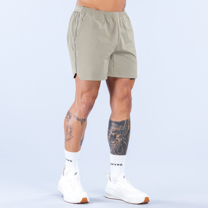Olive 6-inch training shorts with elastic waistband and back yoke seam
