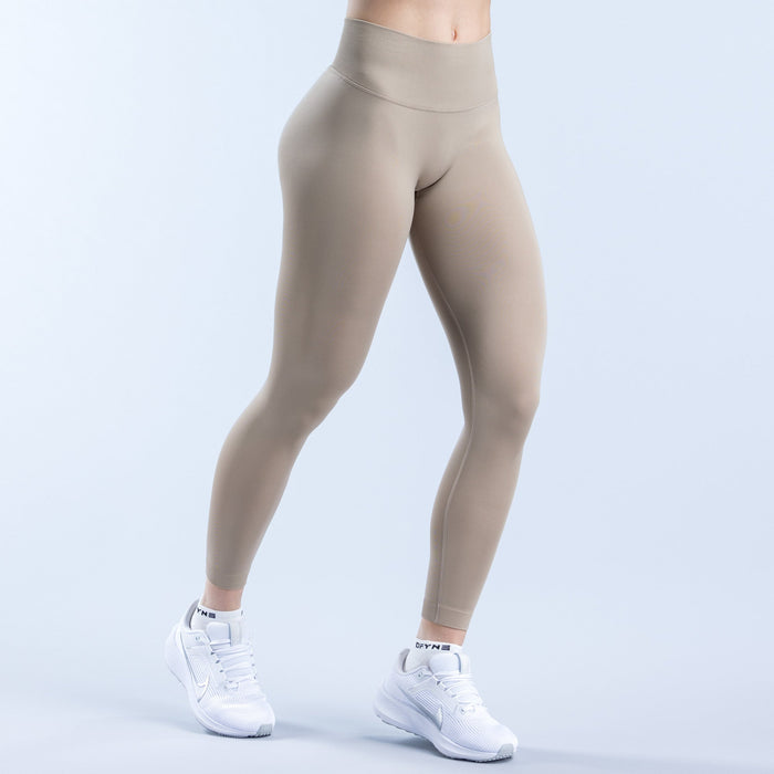 Beige high-rise leggings, full-length with smooth waistband and leg contour seam