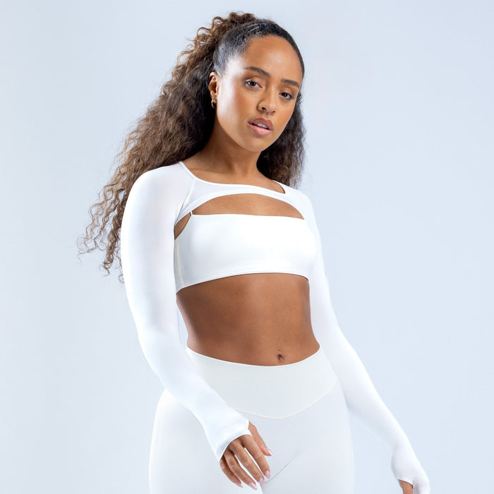 White long-sleeve shrug with chest cutout and fitted cropped silhouette