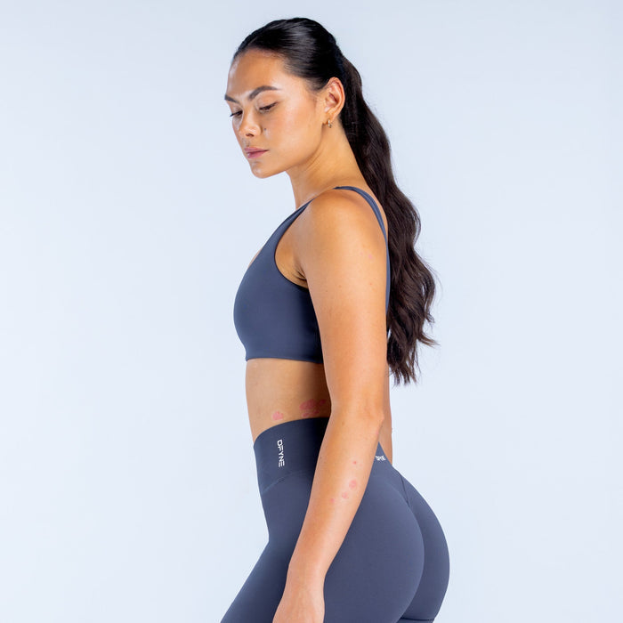 Scoop-back sports bra, dark navy with smooth cropped fit and racerback straps