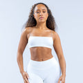 White strappy bra with thin spaghetti straps and straight neckline, front view.