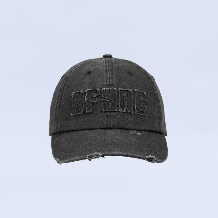 Distressed baseball cap with dark washed finish and curved brim, front embroidered logo