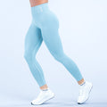 Light blue high-rise leggings with logo detail, ankle length