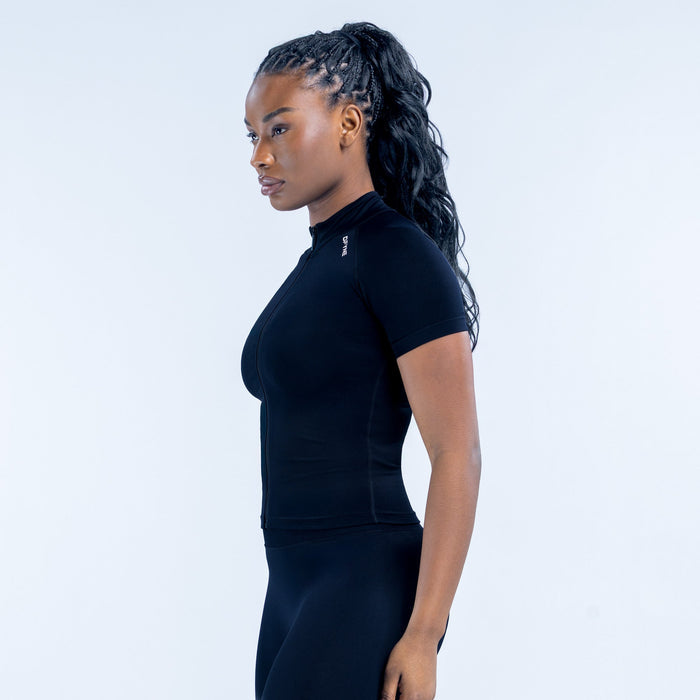 Black short-sleeve zip-up athletic top, side profile