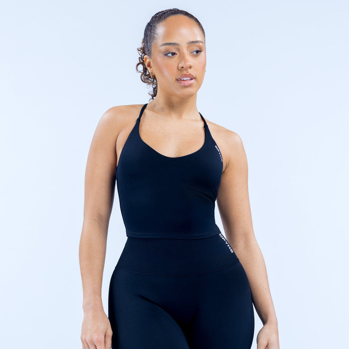 Women's black fitted sports tank with thin straps and scoop neck