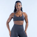 Dark sports bra with thin adjustable straps and scoop front