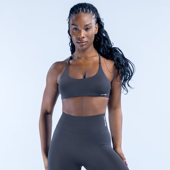 Dark performance sports bra with scoop neckline and slim straps