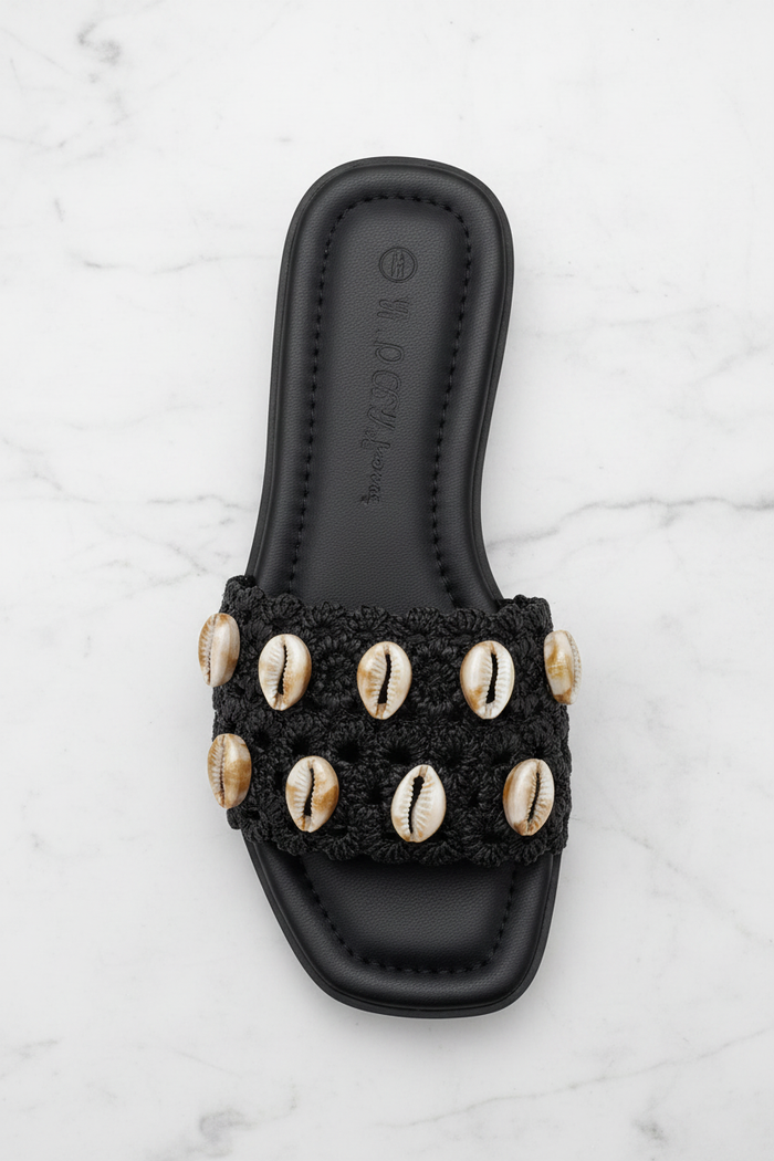 Evani Black Cowrie Shell Raffia Flat Slide Sandals – top-down overhead view showing full sandal