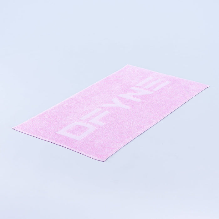 Pink gym towel with geometric pattern, folded