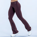 Maroon flare leggings with small chest-height logo, bootcut hem, sporty stretch fabric