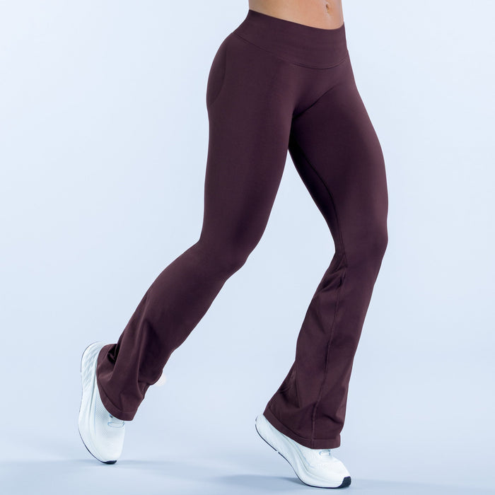 Maroon flare leggings with slanted side seam, wide bootcut opening, ankle length stretch