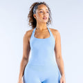 Light blue halter top with racerback-style straps and fitted stretch knit