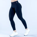 Black high-waist leggings with full-length skinny fit and small back logo