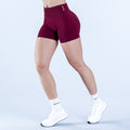 Burgundy 4.5-inch impact shorts, fitted mid-thigh style with elastic waistband
