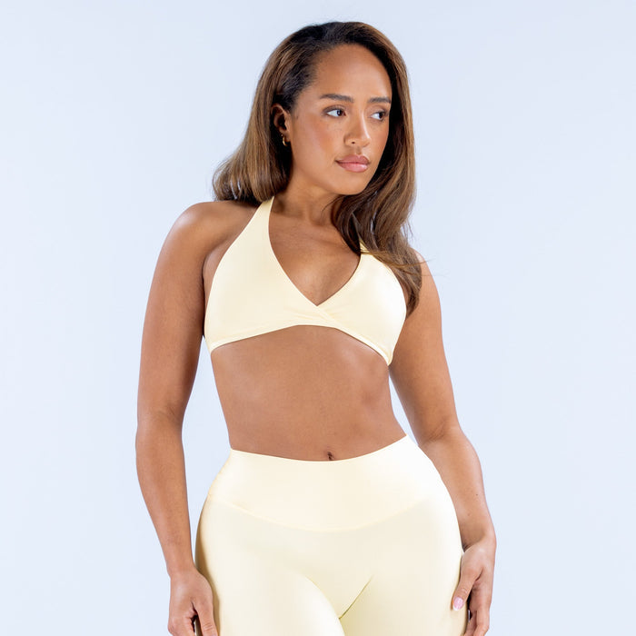 Cream halter bralette bra with V-neck and smooth underbust band