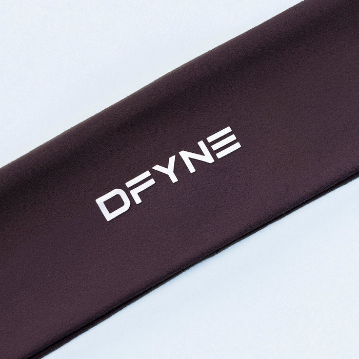 Dark burgundy DFYNE headband close-up showing white logo