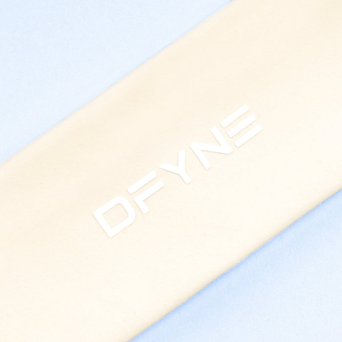 Light beige headband with DYVNE logo text on side