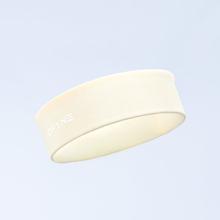 Light beige wide headband with DYVNE logo on front