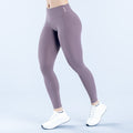 Purple high-rise Origin leggings with smooth fit and ankle-length.