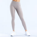 Origin leggings in light taupe, high-rise full-length, smooth waistband.
