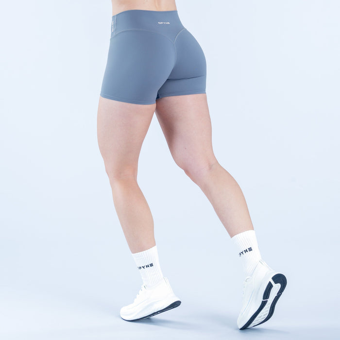 4.5 in blue stretch shorts, side view, contoured leg fit, smooth waistband
