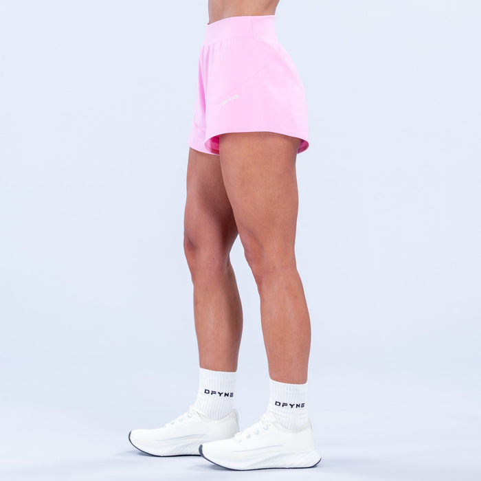 Pink training shorts, relaxed fit with elastic waistband and draped back