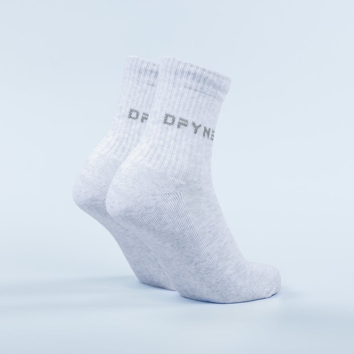 Light blue ribbed quarter socks showing side logo and cushioned sole, pair
