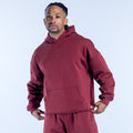 Burgundy graphic hoodie with front kangaroo pocket and adjustable drawstring hood