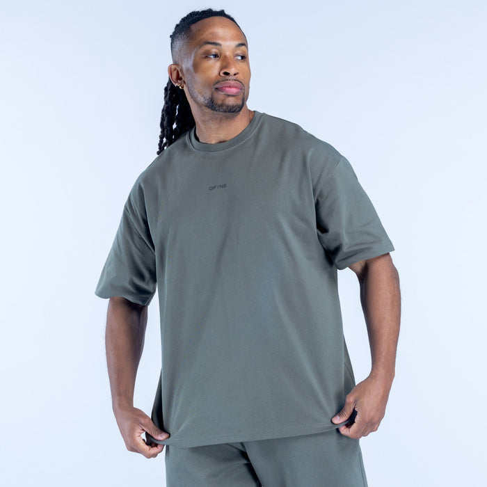 Men's olive green graphic t-shirt with small chest logo, crew neck