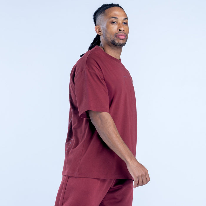 Maroon crewneck T-shirt, short sleeves, side view