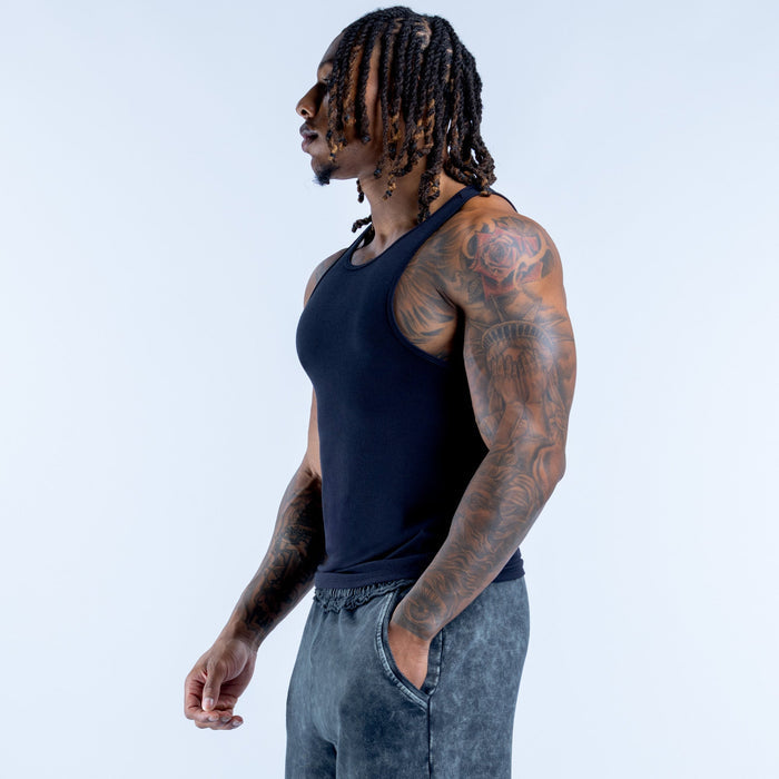 Navy ribbed sleeveless vest in fitted knit, side profile