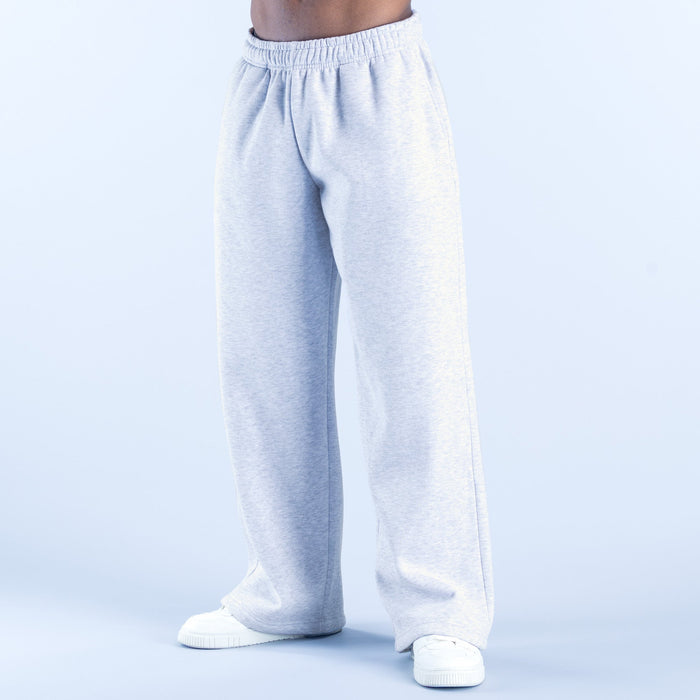 Light gray straight-leg joggers with elastic waistband, side seams, and ribbed cuffs