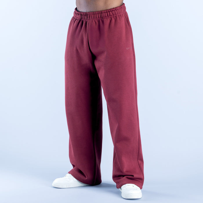 Maroon straight-leg joggers with elastic waistband and side pockets