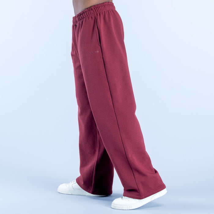 Maroon straight-leg joggers, relaxed fit, elastic waistband and cuffs