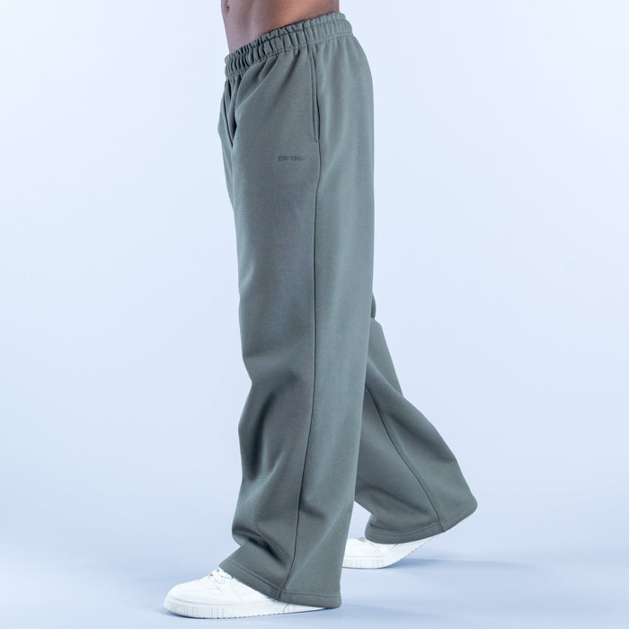 Sage green relaxed joggers with elastic waistband and side seam pockets