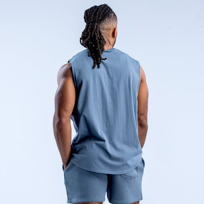 Blue sleeveless tank top, back view, crew neck and relaxed fit