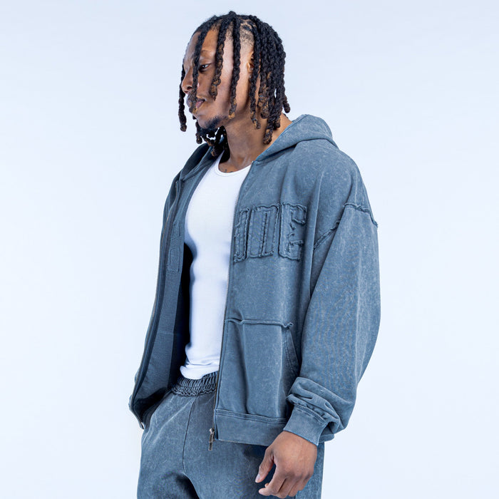 Washed blue zip hoodie with hood and kangaroo pocket, side view