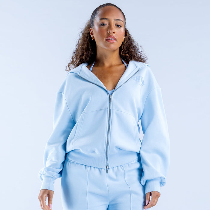 Light blue zip-up graphic hoodie with drawstring hood and front zipper