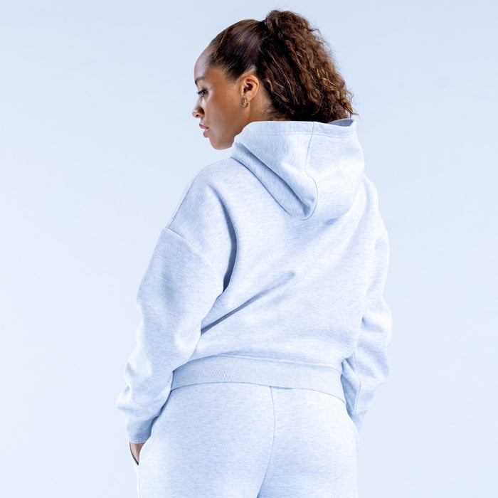 Light blue pullover hoodie shown from the back with hood and kangaroo pocket