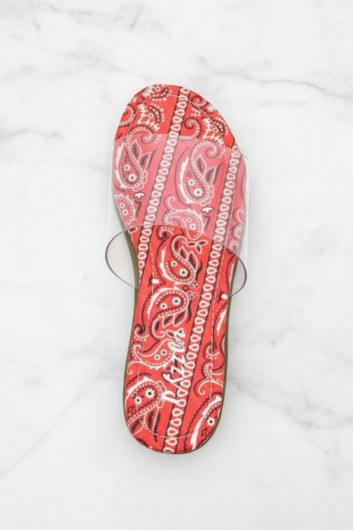 Sierra Red Bandana Paisley Print Clear Strap Flat Slide Sandals – top-down overhead view showing full sandal on white marble
