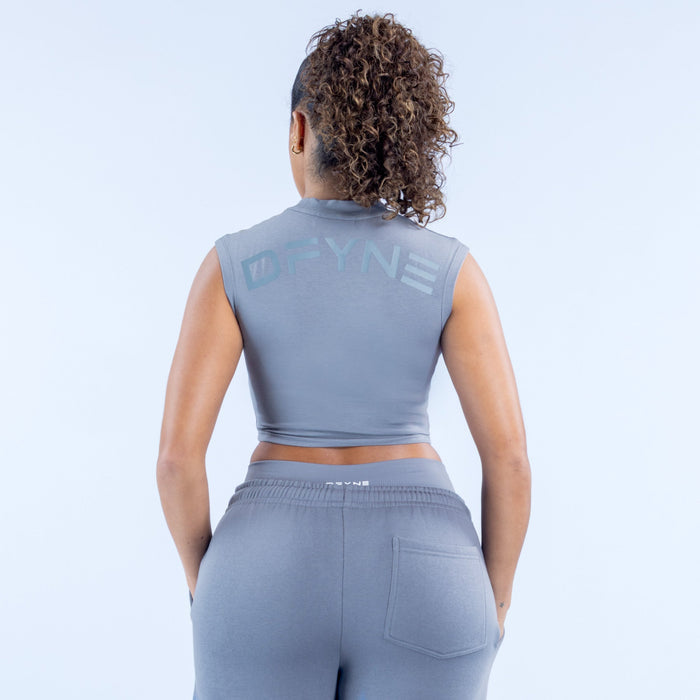 Gray sleeveless cropped baby tee with crew neck and printed logo on back