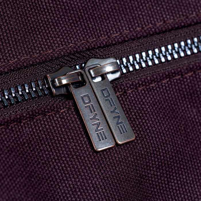 Burgundy duffle bag zipper with branded metal pull tab