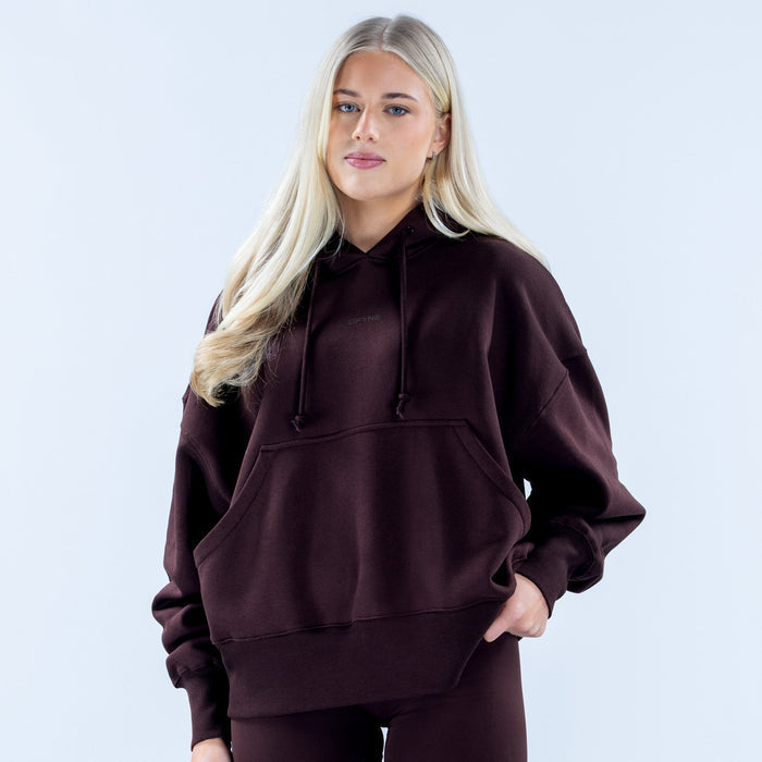 Burgundy pullover hoodie with hood, drawstrings, and front kangaroo pocket
