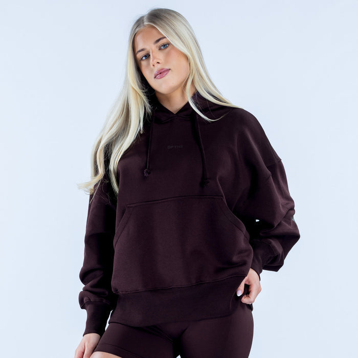 Burgundy pullover hoodie with hood, drawstrings, and kangaroo pocket